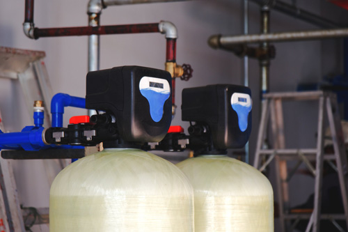 two water softener tanks
